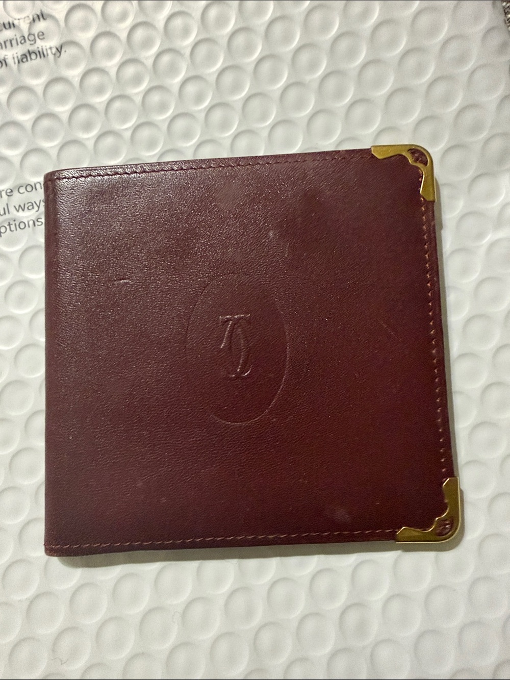Cartier Burgundy Leather Card Holder with Gold Corner Accents